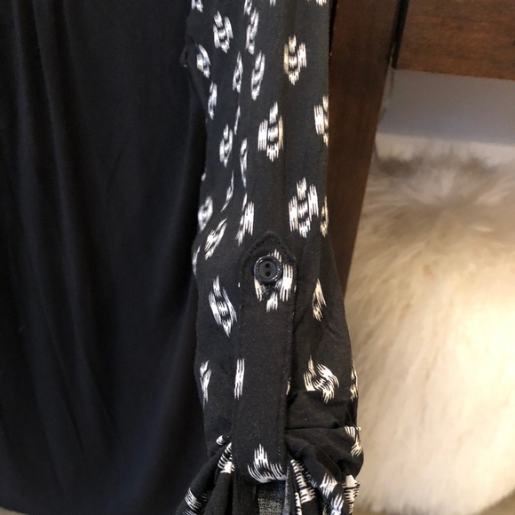 A Black blouse with a White pattern on top - Picture 3 of 3